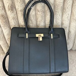 Elegant Black Handbag with Gold Accents